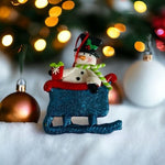 Vintage Resin Snowman in Blue Glitter Sleigh Christmas Ornament 3.5x4.5" VG