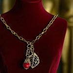 Vintage Gold-Tone Leaf and Red Cherry Bead Charm Necklace With Velvet Pouch NWOT