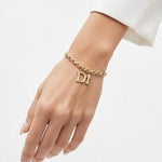 Diamonds International DI Gold Tone Chain Link Charm Bracelet with Gemstone VG