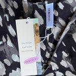 Dokotoo Black White Pattern Oversized V Neck Romper Jumpsuit Women’s Large NWT