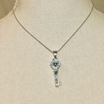 Women's Blue White Crystal Key Pendant Necklace 1.5" Silver Tone Costume VG